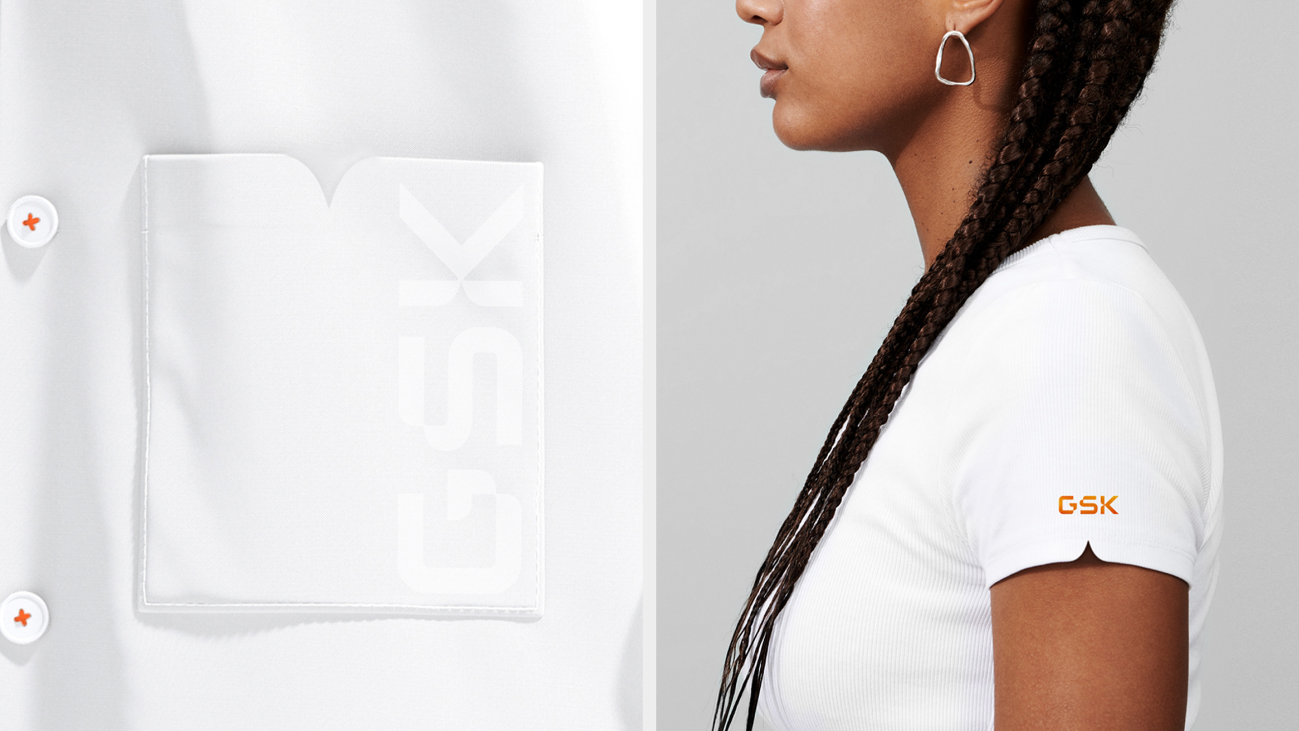 GSK branded white lab coat and white T-shirt worn by a person, featuring the GSK logo.